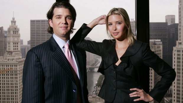 Donald Trump Jr., and his sister Ivanka Trump pose inside the Chicago offices of their father Donald Trump.