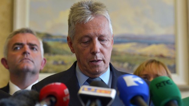 Northern Ireland First Minister Peter Robinson resigns in Belfast. 