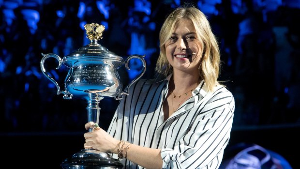 Former ladies single's champion Russia's Maria Sharapova with the Daphne Akhurst Memorial Cup.