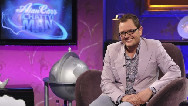 Alan Carr on the set of his popular TV chat show.