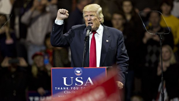 Still campaigning: US President-elect Donald Trump in Cincinnati, Ohio, on Thursday.