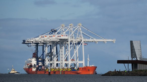 A container ship arrives at the Port of Melbourne.