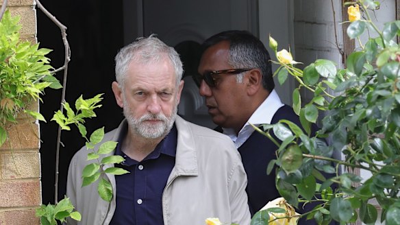 Labour Leader Jeremy Corbyn leaves his home in North London on Sunday.