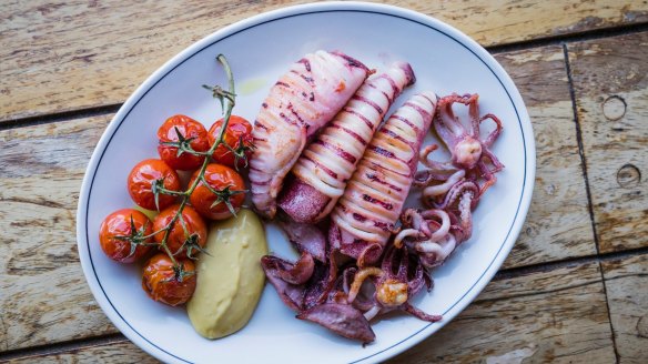 Go-to dish: Wood-fired squid, aioli and cherry tomatoes.