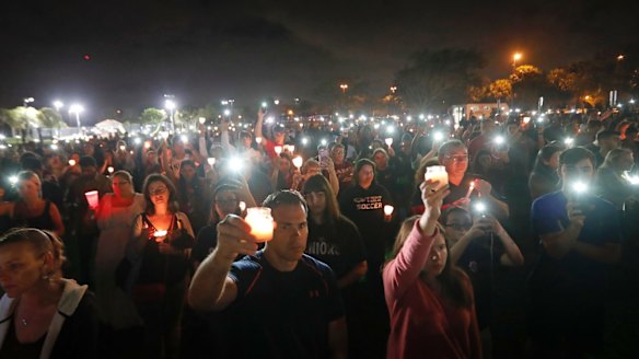 A candlelight vigil in memory of the 17 students and faculty who were killed.