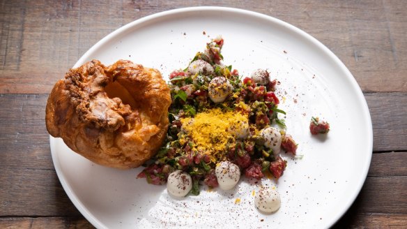 Steak tartare with oyster cream and Yorkshire pudding.