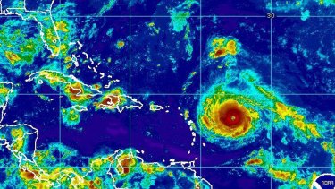 A satellite image provided by the National Oceanic and Atmospheric Administration shows Hurricane Irma nearing the eastern Caribbean.