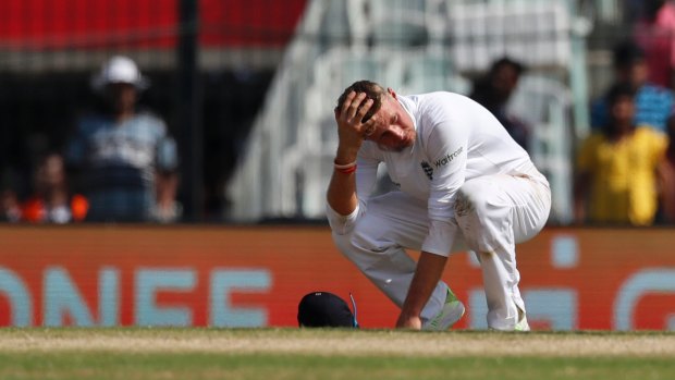 England's Joe Root slumps after an unsuccessful appeal.