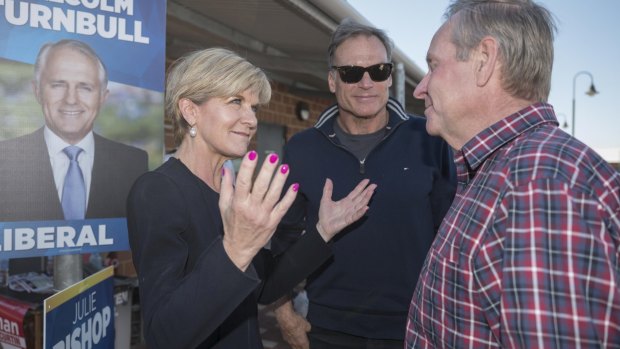 Julie Bishop greets Colin Barnett on polling day for the federal election.