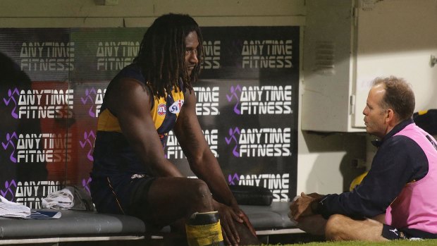 A dejected Nic Naitanui on the Eagles bench on Friday night.