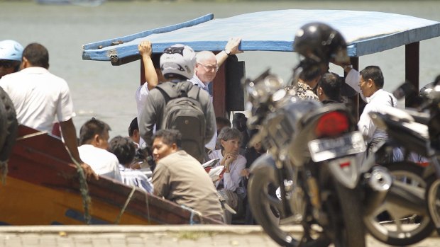 Julian McMahon and Australian consul-general Majell Hind board the ferry at Wijaya Pura port in Cilacap headed for Nusakambangan.