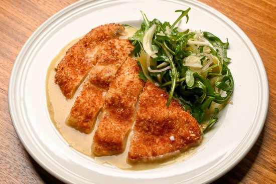 Chicken schnitzel with mustard gravy and fennel salad.