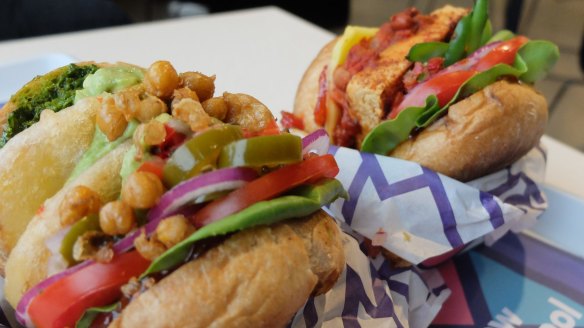 New School Canteen's vegan burgers. Pacha Mama (left) with chilli and spring onion potato cake and chickpea salsa, and Tofu Tantrum with chipotle-spiced mixed bean, tofu and vegan cheese.