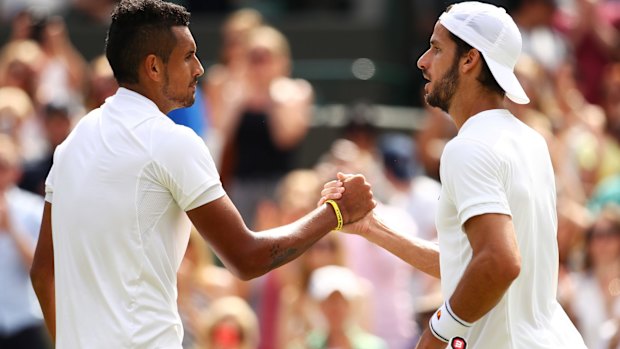 Nick Kyrgios is congratulated by Feliciano Lopez after their third round encounter.