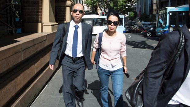 Robert Xie and his wife Kathy Lin arrive at Supreme Court during the trial.