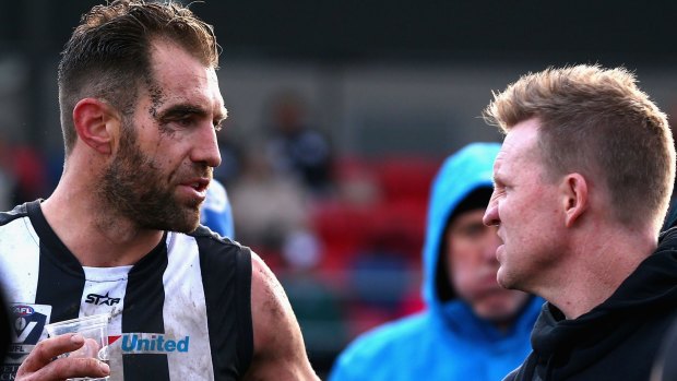 Travis Cloke talking to coach Nathan Buckley this year.