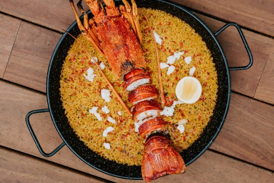 Valencian-style paella with rock lobster.