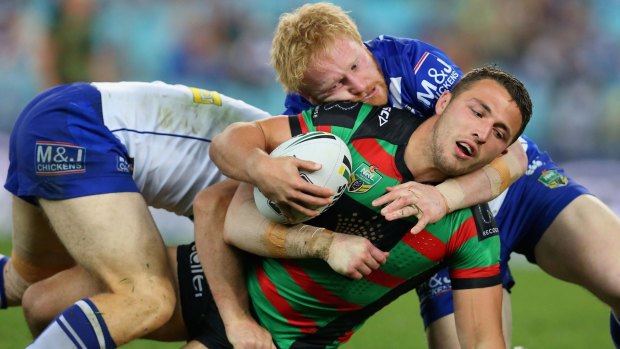 Best of enemies: James Graham gets to grips with Sam Burgess in another episode in the pair's abrasive rivalry.