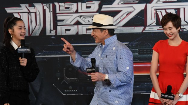 Jackie Chan and his co-stars in <i>Bleeding Steel</i> appeared in Sydney on Thursday; Nana Ouyang, on his left, and Erica Xia-hou. The movie is the biggest budget Chinese production ever shot here.