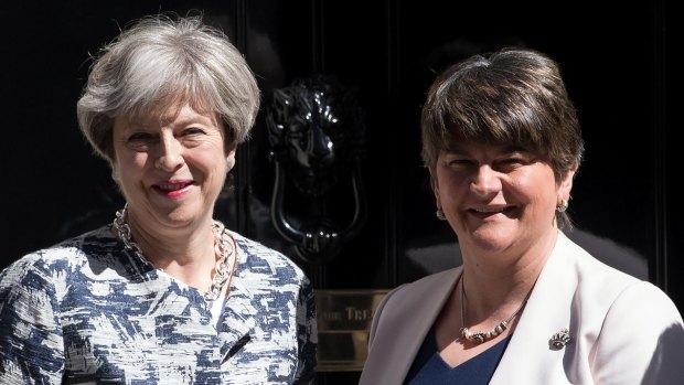 British Prime Minister Theresa May, left, with Arlene Foster, the leader of Northern Ireland's Democratic Unionist Party on June 26.
