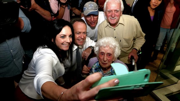 ALP candidate for Lindsay Emma Husar poses with Opposition Leader Bill Shorten and shoppers at Westfield Penrith in western Sydney. 