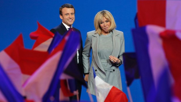 Emmanuel Macron and his wife Brigitte last month.