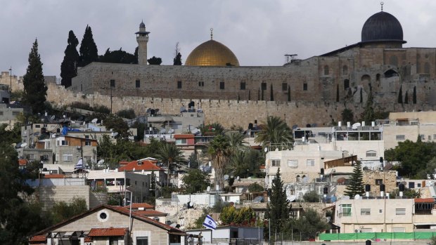 Flashpoint: The golden Dome of the Rock and to its right the dome of the al-Aqsa mosque are seen from the occupied East Jerusalem neighbourhood of Silwan.