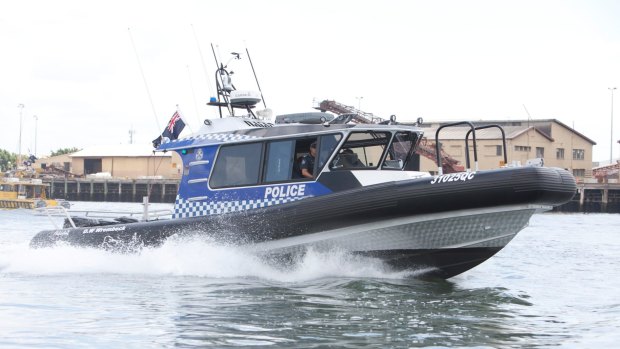 Water Police raced to a sunken dinghy off Beachmere Beach in the early hours of Saturday morning and plucked two fishermen from the water.