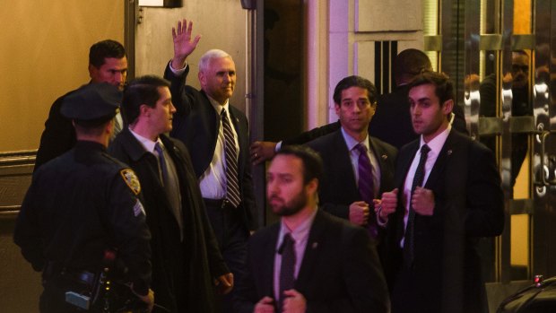 Vice President-elect Mike Pence leaves the Richard Rodgers Theatre in New York after a performance of <i>Hamilton</i>.
