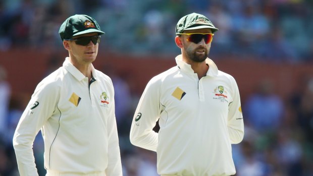 Steeled again: Peter Handscomb and Nathan Lyon in the field on day three