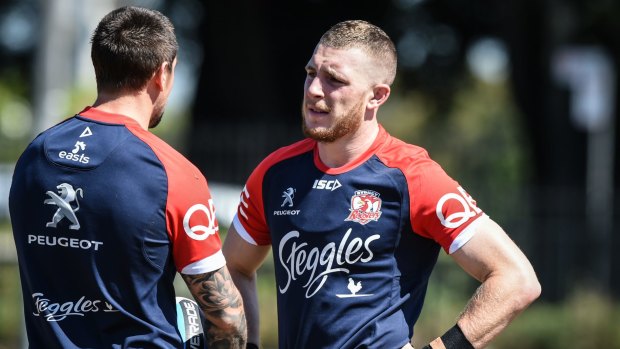 Jackson Hastings gets some tips from suspended Roosters halfback Mitchell Pearce at training this week. 