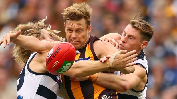 Measuring up: It was a long time between breaks for Hawthorn's Sam Mitchell.