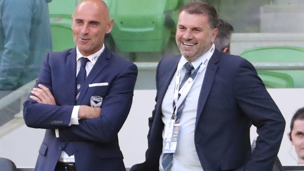 Primed for the fight ahead: Ange Postecoglou (right), pictured with Victory coach Kevin Muscat. 