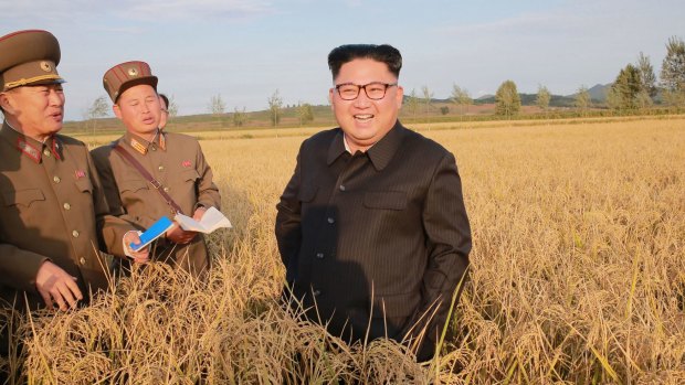 North Korean leader Kim Jong-un, centre, at a farm in North Korea which has historically relied on support from China and Russia.