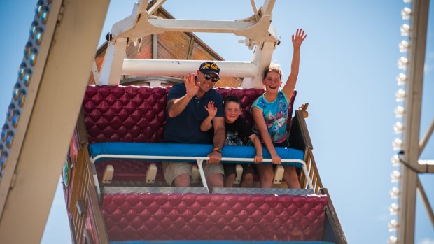 Shane Leslie with his kids Cooper, 6, and Brooklyn,  11, enjoying the new Pirate Ship ride.
