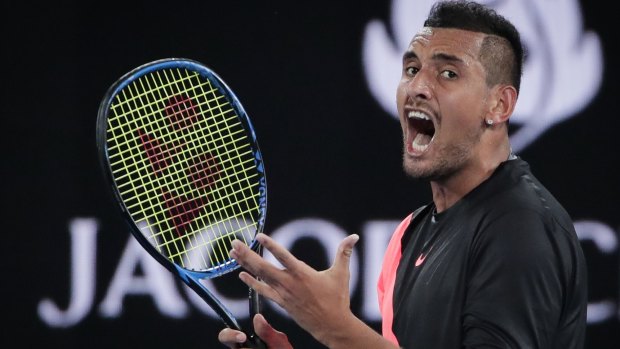 Nick Kyrgios gets fired up against Grigor Dimitrov at the Rod Laver Arena on Sunday night.