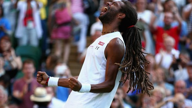 Dustin Brown of Germany celebrates beating Rafael Nadal.