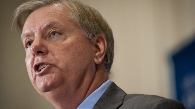Senator Lindsey Graham, a Republican from South Carolina and 2016 Republican presidential candidate, speaks during a National Press Club Luncheon in Washington, D.C., U.S., on Tuesday, Sept. 8, 2015. "I'll do what I can to stop," the funding for the international nuclear agency unless lawmakers can review "side deals" it has with Iran, said Graham. Photographer: Pete Marovich/Bloomberg *** Local Caption *** Lindsey Graham
