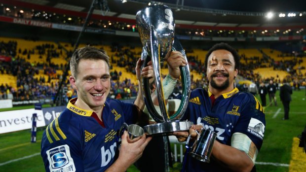 The champs are here: Ben Smith and Nasi Manu of the Highlanders hold up the trophy following the Super Rugby final against the Hurricanes in 2015. 