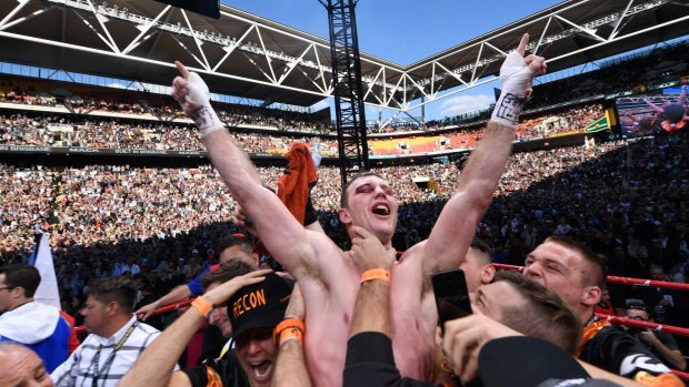 Top of the world: Jeff Horn points to the sky in celebration after being announced the winner.