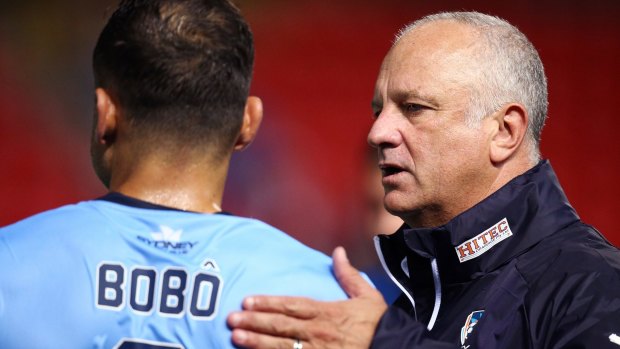 Graham Arnold turned to other codes to improve his coaching performance.