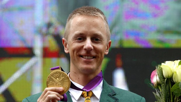 Better late than never: Jared Tallent was presented with a retrospective 50km walk gold medal after Russian Sergey Kirdyapkin was stripped of the London 2012 title for doping.