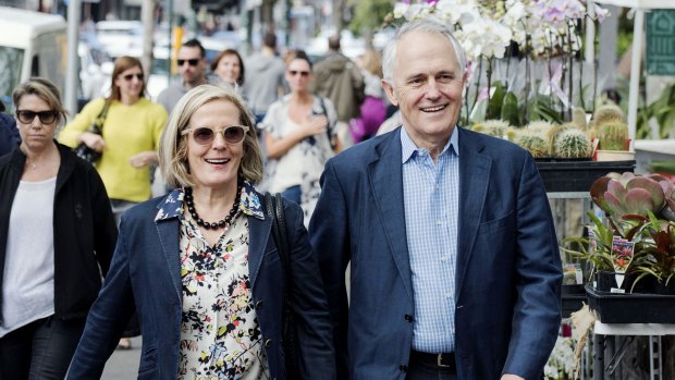 Power walkers: Lucy and Malcolm Turnbull stroll through Paddington last month.