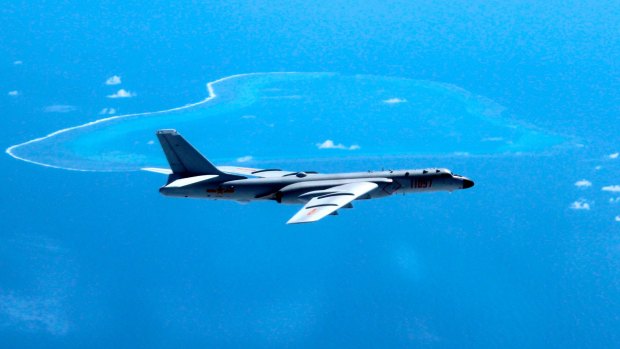 A Chinese H-6K bomber patrols the South China Sea. A dispute over islands and reefs in the area will remain in the background.