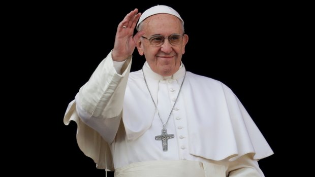 Pope Francis gives Donald Trump a big high-five.