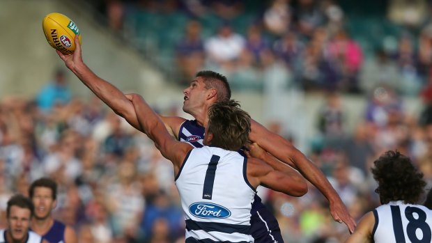 Aaron Sandilands wins one of his 48 hit outs for the Dockers, who also dominated clearances yet were thrashed by Geelong. 