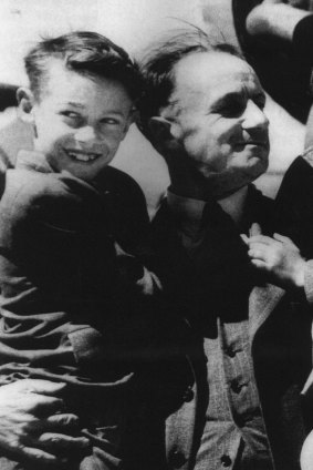 Father and son: John Bradman with his famous father before leaving for a tour of England in 1948.