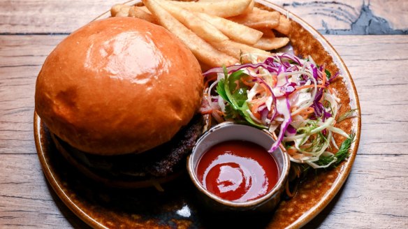 The signature burger is a fine example of the genre.