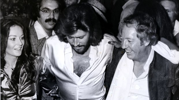 Robert Stigwood, right, with Barry and Linda Gibb at the Saturday Night Fever launch party.