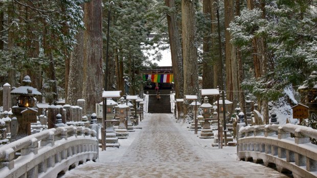 Crossing the bridge into the most sacred place in Japan, Okunoin, where Kobo Daishi rests in eternal meditation.